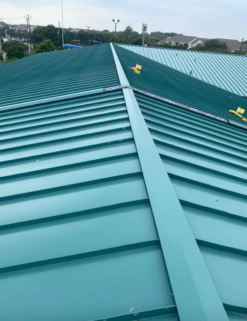 Green commercial metal roof ridge and valley for Metal Roof Repair in Dennis